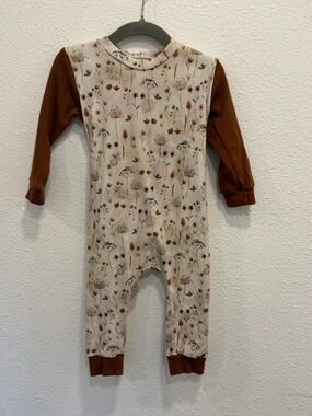 Neutral Floral One-Piece Bodysuit with Rust Sleeves